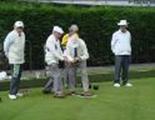 blind and partially sighted bowlers preparing to bowl